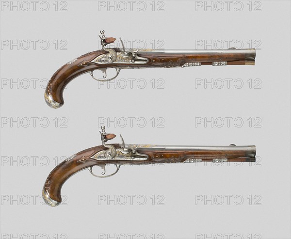 Pair of Flintlock Pistols, c. 1720, German, Suhl, Thuringia, Suhl, Steel, gilding, gold, and walnut, Overall L.: 40.6 cm (16 in.)