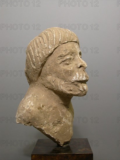 Male Head, 2nd/3rd century, Afghanistan or Pakistan, Ancient region of Gandhara, Gandhara, Stucco, 22.3 × 12.5 × 10.5 cm (8 3/4 × 4 15/16 × 4 1/8 in.)