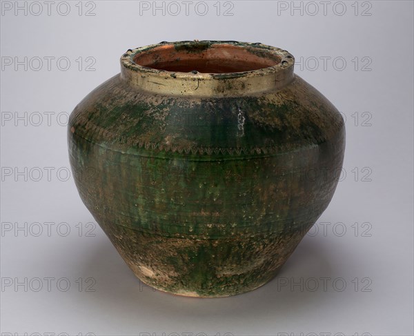 Jar with Sawtooth and Encircling Bands, Eastern Han dynasty (A.D. 25–220), China, Earthenware with lead green glaze and underglaze carved decoration, H. 10 1/2 in.
