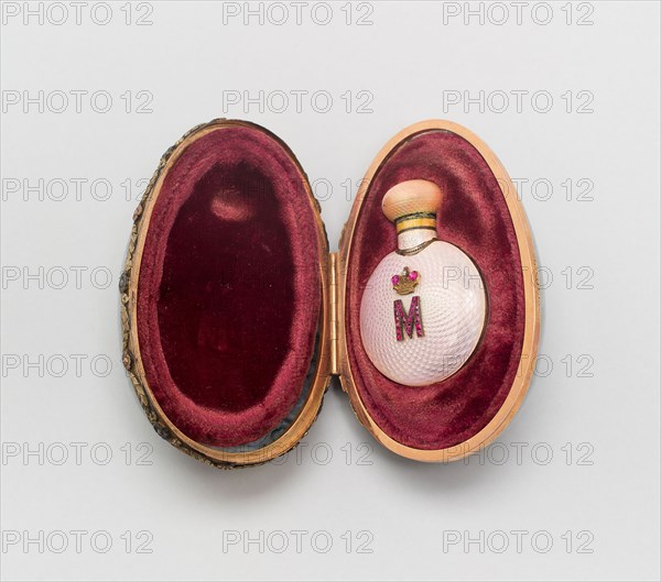 Miniature Easter Egg with Scent Bottle, Before 1899, Fabergé Workshop, Saint Petersburg, Russia, 1842-1917, Saint Petersburg, Moss agate, gold, enamel, and cabochon rubies, 5.1 x 8.3 x 5.6 cm (2 x 3 1/4 x 2 3/16 in.)