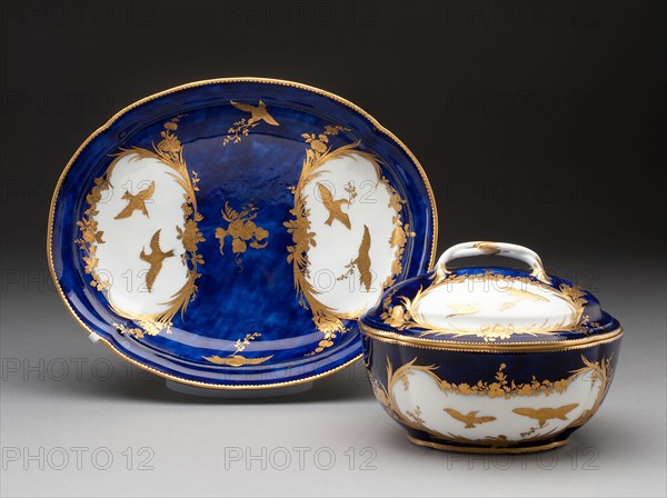 Sugar Bowl and Stand, c. 1753, Vincennes Porcelain Manufactory, French, founded 1740 (known as Sèvres from 1756), Vincennes, Soft-paste porcelain, underglaze blue ground, and gilding, 13 x 20.5 x 26 cm (5 1/8 x 8 1/16 x 10 1/4 in.)