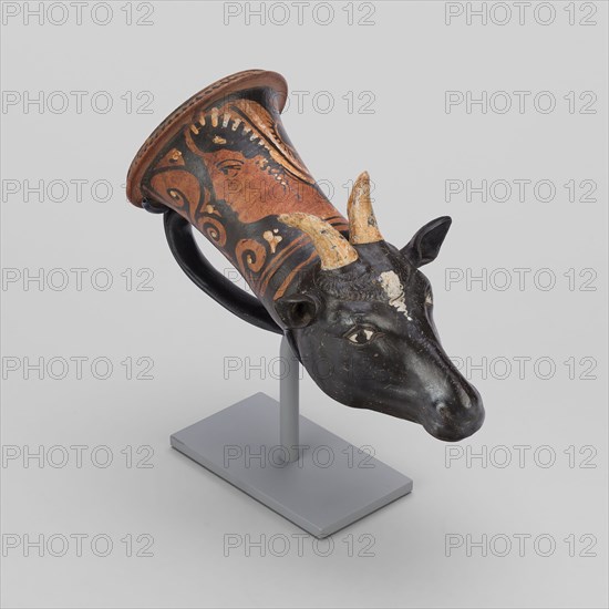 Rhyton (Drinking Vessel) in Shape of Sheep’s Head, about 320/310 BC, Attributed to the Painter of Leningrad 955, Greek, Tarentum (now Taranto), Apulia, Italy, Southern Italy, terracotta, decorated in the red-figure technique, 20.9 × 11.4 × 12 cm (8 1/4 × 4 1/2 × 4 3/4 in.)