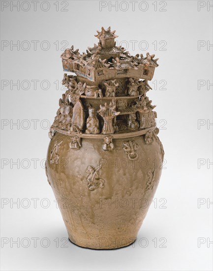 Funerary Urn (Hunping), Western Jin dynasty (A.D. 265–316), late 3rd century, China, Stoneware with olive-green glaze and molded and applied decoration, H. 48.7 cm (19 3/16 in.), diam. 27.5 cm (10 13/16 in.)
