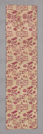 Panel, c. 1720, England or France, England, silk, satin weave with supplementary patterning wefts and self-patterned by areas of weft-float faced twill weave, two selvages present. Central cartouche with inscription surrounded by regularly placed carpenter's tools, say, compass, drill, plane, and mallet, in red on off-white ground, 223.3 × 57.1 cm (87 7/8 × 22 1/2 in.)