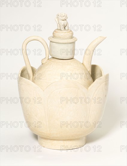 Wine Ewer and Warming Bowl, Northern Song dynasty (960–1127), China, Qingbai ware, porcelain with underglaze carved and incised decoration, Ewer: h. 16.4 cm (6 3/8 in.), diam.15.1 cm (5 7/8 in.), bowl: h. 13.8 cm (5 3/8 in.), diam. 16.6 cm (6 1/2 in.)