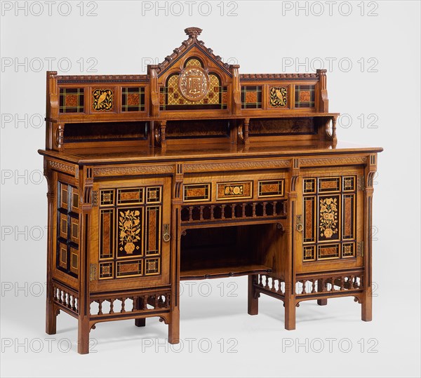 Drawing Room Cabinet, 1871/72, Designed by Bruce James Talbert, Scottish, active in England, 1838–1881, Made by Gillow & Company, England, 1730–1974, Lancaster, Walnut, ebony, boxwood, thuya, maple, and other woods, gilding, and lacquered brass mounts, 148.6 x 166.4 x 52.1 cm (58 1/2 x 65 1/2 x 20 1/2 in.)