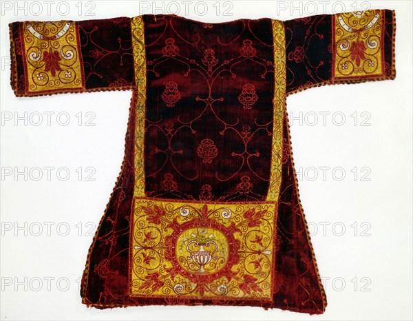 Dalmatic, Late 15th century, Apparels later due to satin binding, Italy, Silk, warp-float faced 4:1 satin weave with supplementary pile warps forming cut voided velvet, apparels: silk, warp-float faced 7:1 satin weave, appliquéd with warp-float faced 7:1 satin weave, painted, embroidered and appliquéd with silk in laid work and couching, fringe: silk, warp faced plain weave with extended ground weft fringe, lining: cotton, warp-float faced 4:1 satin weave, underlining: hemp, 114.3 x 145.6 cm (45 x 57 1/4 in.)