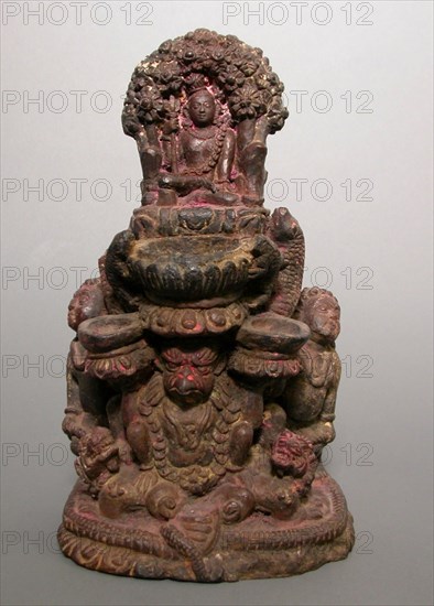Lamp with Deified Figure Upheld by Garuda, 15th century or earlier, Nepal, Nepal, Terracotta with traces of vermilion pigment, 33 x 19.6 x 17.4 cm (13 x 7 11/16 x 6 13/16 in.)
