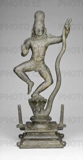 God Krishna Dancing on the Head of the Snake Demon Kaliya (Kaliyadamana), Vijayanagar period, 14th century, India, Tamil Nadu, Tamil Nadu, Bronze, 67.5 × 28.6 × 21.7 cm (26 9/16 × 11 1/4 × 8 9/16 in.)
