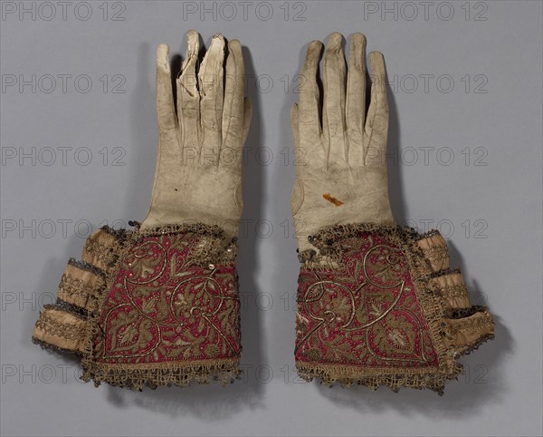 Pair of Men’s Gloves, 1600/50, England, Gloves: leather, Gauntlets: silk, satin weave, embroidered with linen, gilt-metal-coiled wire and strips, and gilt-metal-strip-wrapped silk in couching and padded couching, ribbons of silk, plain weave, edged with gilt-metal-strip-wrapped silk, bobbin straight lace, metal spangles, a: 35.5 × 19.2 cm (14 × 7 1/2 in.)