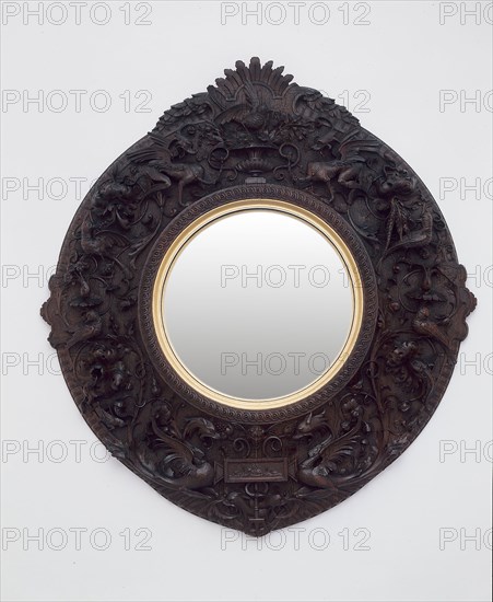 Mirror, 1870, Siena, Italy, Carlo Bartolozzi (Italian, 1835-1922) and Nicodemo Ferri (Italian, c. 1835-1899), Siena, Walnut, glass, and gilding, 45.7 × 41.5 cm (18 × 16 3/8 in.)