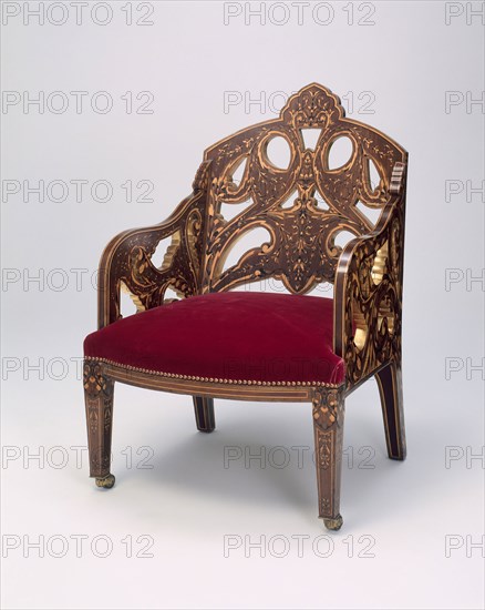 Armchair, 1867/70, Designed by Owen Jones, English, 1809–1874, Made by Jackson & Graham, London, c. 1840–85, London, Mahogany, purpleheart, ebony, harewood, holly, and brass, 96.5 × 63.5 × 76.2 cm (38 × 25 × 30 in.)