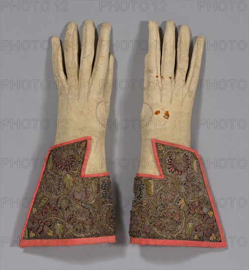 Pair of Men’s Gloves, 1625/50, England, Gloves: white kid leather, gauntlets: linen, plain weave, embroidered with silk, gilt- and silvered-metal-strip-wrapped silk, and gilt- and silvered-metal purl, coiled wires, and spangles in detached buttonhole, padded detached buttonhole, plaited braid, a: 33 × 15.2 cm (13 × 6 in.)