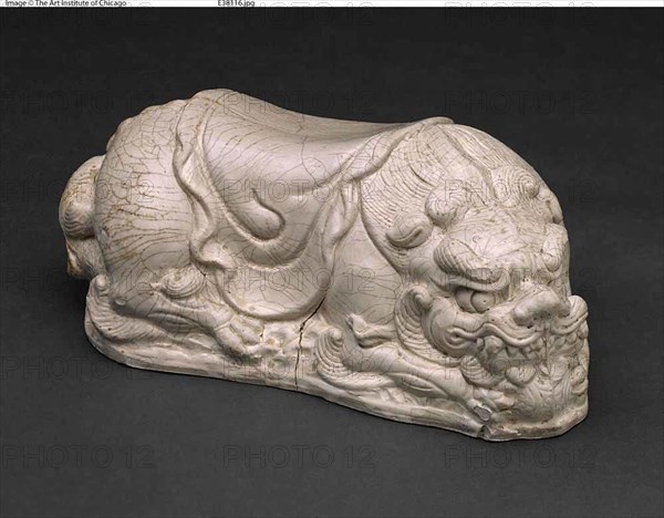 Lion-Shaped Pillow, Probably Northern Song (960–1127) or Jin dynasty  (1115–1234), 11th/13th Century, China, Cizhou-type ware, gray stoneware, slip-coated with molded and carved decoration, 13.7 × 31.9 × 18.4 cm (5 3/8 × 12 9/16 × 7 1/4 in.)