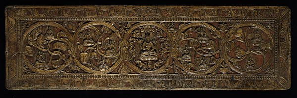 Book Cover for a Manuscript of the Perfection of Wisdom (Ashtashasrika Prajnaparamita) Sutra, 14th century, Tibet, South Central Tibet, Tibet, Wood with traces of red pigment and gilding, 68 x 20 x 2.1 cm (26 3/4 x 7 7/8 x 7/8 in.)