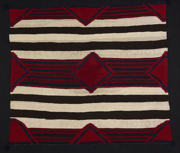 Chief Blanket (Third Phase), c. 1860/65, Navajo (Diné), Northern New Mexico or Arizona, United States, Southwest, Wool, single interlocking tapestry weave, twined edges, corner tassels, 149.6 x 173.9 cm (58 7/8 x 68 1/2 in.)
