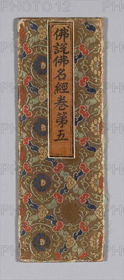 Sutra Cover, Ming dynasty (1368–1644), c. 1590s, China, Silk and gold-leaf-over-lacquered-paper strips, twill weave with twill interlacings of secondary binding warps and patterning wefts, wrapped over cardboard, applied label of silk, plain weave, with inscribed title painted and/or printed with ink, 34.1 × 12.2 cm (13 1/2 × 4 3/4 in.)