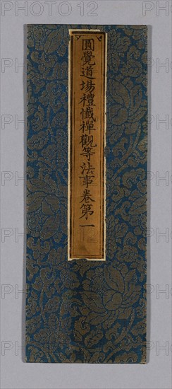 Sutra Cover, Ming dynasty (1368–1644), c. 1590’s, China, Silk and gold-leaf-over-lacquered-paper strips, gauze weave with supplementary patterning wefts, label: silk, plain weave, painted, over paper, 33 × 11.7 cm (13 × 4 5/8 in.)