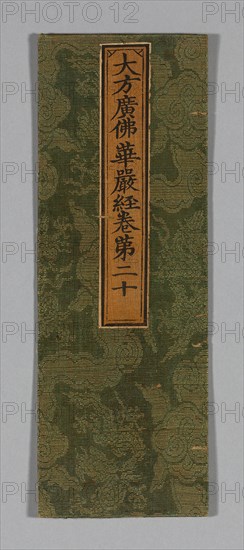 Sutra Cover, Ming dynasty (1368–1644), c. 1590’s, China, Silk and gold-leaf-over-lacquered-paper strip, gauze weave with supplementary patterning wefts, label: silk, plain weave, painted with ink, over paper, 34.5 × 12.2 cm (13 5/8 × 4 3/4 in.)