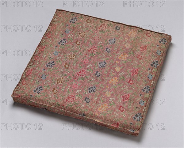 Cushion, Qing dynasty (1644– 1911), late 19th century, China, Silk, warp-float faced 5:1 satin weave with weft-float faced 1:2 'S' twill interlacings of secondary binding warps and supplementary patterning and self-patterning ground wefts, 5.0 × 50.0 × 46 cm (2 × 19 5/8 × 18 1/8 in.)