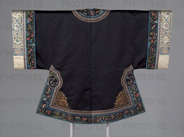Woman’s Surcoat, Qing dynasty (1644–1911), 1860/90, Han-Chinese, China, Body: silk, warp-float faced 7:1 satin weave, embroidered with silk and gold-leaf-over-lacquered-paper-strip-wrapped wild silk in laid work and couching, neck, front, hem, sides and sleeves: silk, warp-float faced 7:1 satin weave, embroidered with silk and gold-leaf-over-lacquered-paper-strip-wrapped silk wrapped cotton in knot, satin and stem stitches, laid work and couching, edged with silk, warp-float faced 7:1 satin weave, sleeve bands: silk, warp-float faced 7:1 satin weave, embroidered with silk and gold-leaf-over-lacquered-paper-strip-wrapped silk in knot, satin and stem stitches, laid work and couching, three ribbons: silk and gold-leaf-over-lacquered-paper-strip-wrapped cotton, plain weave self-patterned by main warp floats (narrowest has gold-leaf-over-lacquered-strip-wrapped silk), lined with silk, plain weave, 97.5 × 130.2 cm (38 3/8 × 51 1/4 in.)