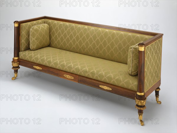 Box Sofa, c. 1820, Attributed to Duncan Phyfe, American, born Scotland, 1768–1854, United States, Rosewood and gilded wood, with ormolu mounts, die-stamped brass inlay inset with rosewood, brass stringing, and gilt-brass castors, 85.7 × 208.3 × 69.2 cm (33 3/4 × 82 × 27 1/4 in.)