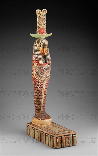 Statue of Ptah-Sokar-Osiris, Ptolemaic Period (332–30 BC), Egyptian, Egypt, Wood, preparation layer, pigment, gold, and textile, 62.9 × 12.7 × 27.3 cm (24 3/4 × 5 × 10 3/4 in.)