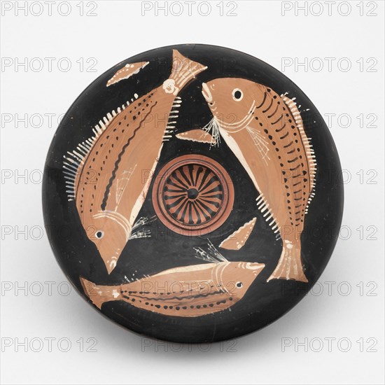 Fish Plate, 340/320 BC, Attributed to the Perrone-Phrixos Group, Greek, Tarentum (now Taranto), Apulia, Italy, Tarentum, terracotta, decorated in the red-figure technique, 4.2 × 20.4 × 20.4 cm (1 5/8 × 8 1/16 × 8 1/16 in.)