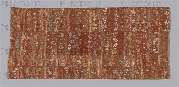 Seating Mat, Meiji period (1868–1912), 1875/1900, Japan, Pieced: 18 fragments of silk and gold-leaf-over-lacquered-paper strip, warp-float faced 4:1 satin weave with weft-float faced 1:2 'z' twill interlacings of secondary binding warp and supplementary patterning wefts, lined with silk, plain weave, 41.7 x 93.7 cm (16 3/8 x 36 7/8 in.)