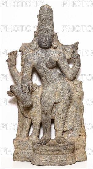 God Shiva as Lord Who Is Half-Male, Half-Female (Ardhanarishvara), 14th century, India, Tamil Nadu, Tamil Nadu, Granite, 123.5 × 59.4 × 27.3 cm (48 5/8 × 23 3/8 × 10 3/4 in.)