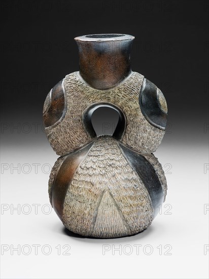 Stirrup Vessel with Textured Surface, c. 800 B.C., Chavín, North coast, Peru, North Coast, Ceramic and pigment, 21.6 × 12.7 × 12.7 cm (8 1/2 × 5 × 5 in.)