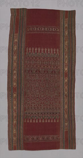 Ceremonial Cloth (Pua sungkit), 19th century, Iban, Indonesia, Borneo, Sarawak, Indonesia, Three panels joined: Side panels: cotton, stripes of plain weave and of warp resist dyed (warp ikat) plain weave, Center panel: cotton,  plain weave with supplementary patterning and brocading and twining wefts and supplementary wrapping elements, 218.4 x 104.8 cm (86 x 41 1/4 in.)