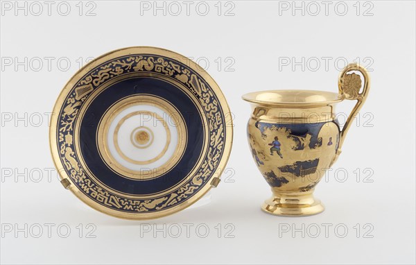 Cup and Saucer, c. 1820, Denuelle Porcelain Manufactory, French, 1818-1829, Paris, Hard-paste porcelain, dark blue ground, polychrome enamels, and gilding, Cup: H. 11 cm (4 5/16 in.), Saucer: diam. 13.5 cm (5 5/16 in.)