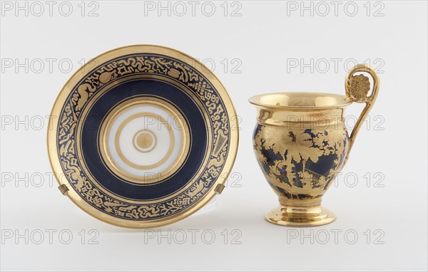 Cup and Saucer, c. 1820, Denuelle Porcelain Manufactory, French, 1818-1829, Paris, Hard-paste porcelain, dark blue ground, polychrome enamels, and gilding, Cup: H. 11 cm (4 5/16 in.), Saucer: diam. 13.5 cm (5 5/16 in.)