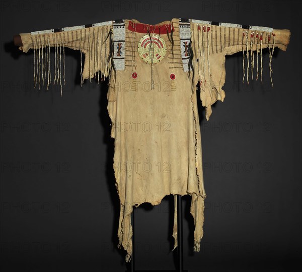 War Shirt, 1830/40, Upper Missouri River Tribe, Missouri, United States, Missouri, Deer hide, ermine tails, glass pony beads, hair, porcupine quills, and trade cloth, Appro×. 101.6 × 50.8 cm (40 × 20 in.)