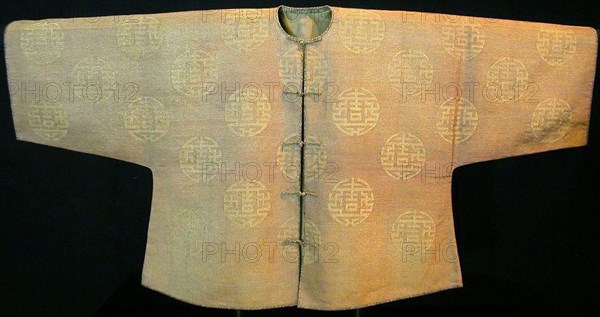 Woman’s Riding Jacket, 18th century, Qing dynasty (1644–1911), China, Silk and gold-leaf-over-lacquered-paper strip, slit tapestry weave, edges with silk, rayon and gold-leaf-over-lacquered-paper strip satin weave with plain interlacings of secondary binding warp and patterning wefts, lined with silk, plain weave, 77.2 × 154 cm (30 3/8 × 60 5/8 in.)