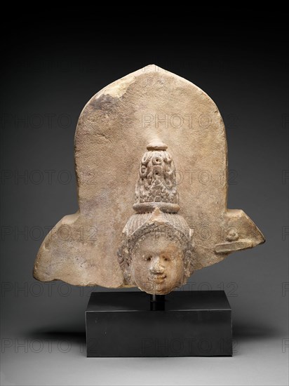 Head of a Female Deity, c. 9th/13th century, Indonesia, Borneo, Kutai Province, Gunung Kombeng, Borneo, Sandstone, 37.2 × 39.7 × 21.6 cm (14 5/8 × 15 5/8 × 8 1/2 in.)
