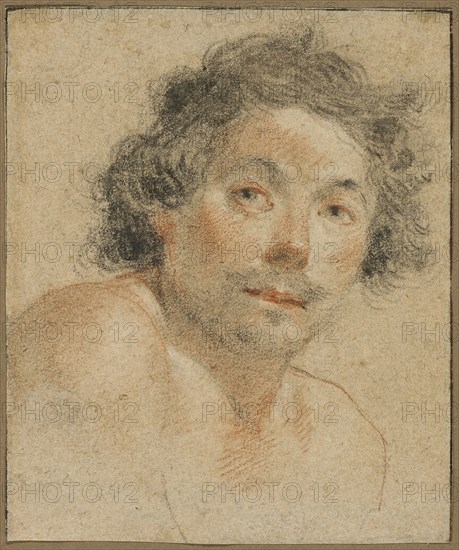 Bust Portrait of a Young Man, 1620/25, Simon Vouet, French, 1590-1649, France, Black and red chalk, with stumping, on tan laid paper, 142 × 119 mm
