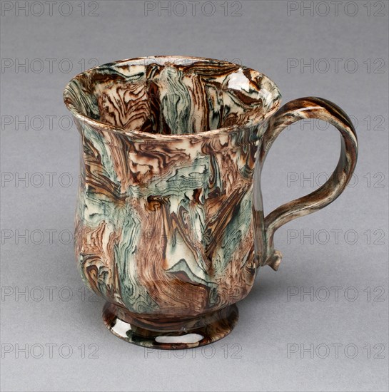 Cup, 1750/59, Staffordshire, England, Staffordshire, Lead-glazed earthenware (agateware), 7 x 8.3 x 5.7 cm(2 3/4 x 3 1/4 x 2 1/4 in.)