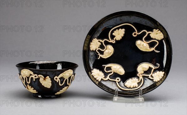 Cup and Saucer, c. 1750/65, Staffordshire, England, Staffordshire, Lead-glazed earthenware (blackware), Cup 3.5 x 7.9 cm (1 3/8 x 3 1/8 in.), Saucer 1.9 x 11.4 cm (3/4 x 4 1/2 in.)