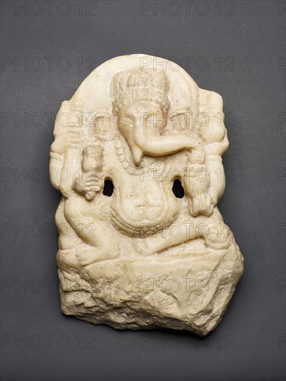 Four-Armed Seated God Ganesha, Shahi period, 7th/8th century, Pakistan or Afghanistan, Afghanistan, Marble with traces of pigment, 22.6 × 15.3 × 3.9 cm (8 7/8 × 6 × 1 1/2 in.)