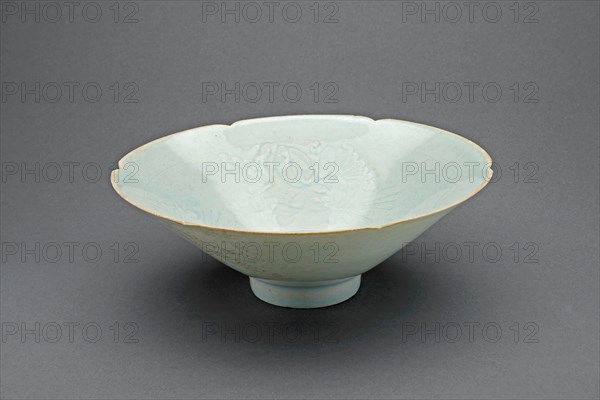 Lobed Bowl with Lotus Scrolls, Southern Song dynasty (1127–1279), China, Qingbai ware, porcelain with underglaze carved decoration, H. 8.3 cm (3 5/16 in.), diam. 17.7 cm (7 in.)