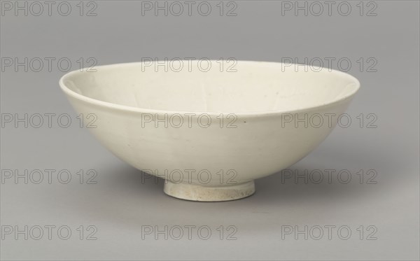 Bowl with Flowering Branches and Insects, Liao (907–1125) or Jin dynasty (1115–1234), c. 10th/12th century, China, Porcelain with underglaze thread relief, H. 4.4 cm (1 3/4 in.), diam. 11.3 cm (4 1/2 in.)