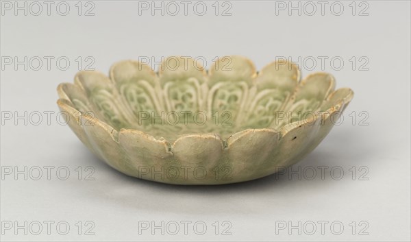 Scalloped Dish with Stylized Floral Sprays and Sickle-Leaf Scrolls, Northern Song (960–1127) or Jin dynasty (1115–1234), 12th/13th century, China, Yaozhou ware, glazed stoneware with underglaze molded decoration, H. 2.5 cm (1 in.), diam. 9.3 cm (3 11/16 in.)