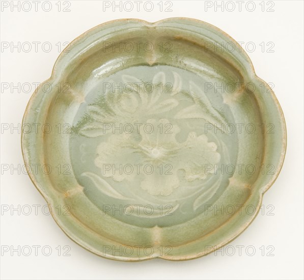 Dish with Petal-Lobed Rim, Lotus, and Waterweeds, Northern Song dynasty (960–1127), 11th/12th century, China, Yaozhou ware, stoneware with underglaze molded decoration, H. 2.8 cm (1 1/8 in.), diam. 10.9 cm (4 5/16 in.)