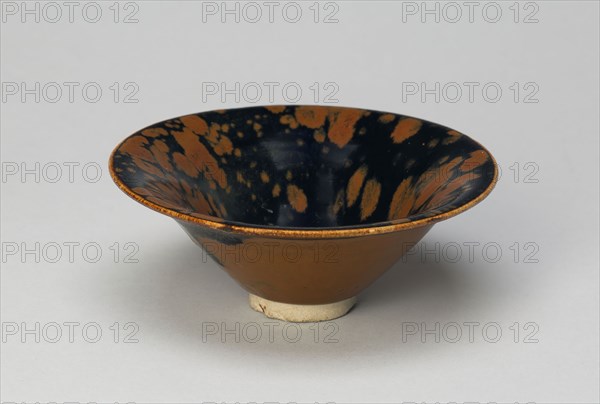 Bowl with Flared Rim and Partridge-feather Mottles, Northern Song (960–1127) or Jin dynasty (1115–1234), late 11th/12th century, China, Northern black ware, Cizhou type, stoneware with overglaze and russet markings (interior) and russet skin(exterior), H. 4.7 cm (1 7/8 in.), diam. 12.5 cm (4 15/16 in.)