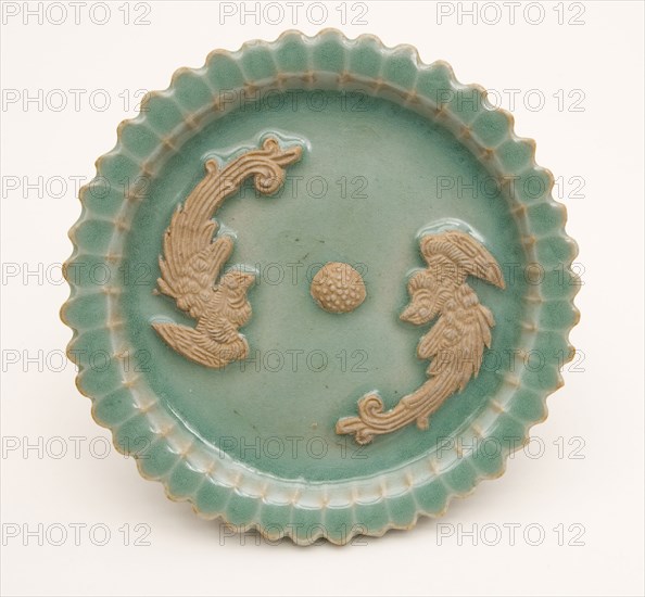 Scalloped-Rim Dish with Confronted Phoenixes and Floral Stamen, Yuan dynasty (1271–1368), China, Longquan ware, stoneware with underglaze molded decoration and applied decoration in biscuit reserve, H. 1.9 cm (3/4 in.), diam. 13.1 cm (5 3/16 in.)
