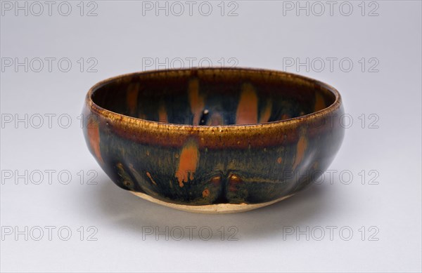 Shallow Lobed Bowl, Northern Song (960–1127) or Jin dynasty (1115–1234), c. 12th century, China, Northern blackware, Cizhou type, stoneware with russet-streaked dark brown glaze, H. 4.3 cm (1 3/4 in.), diam. 10.8 cm (4 5/16 in.)