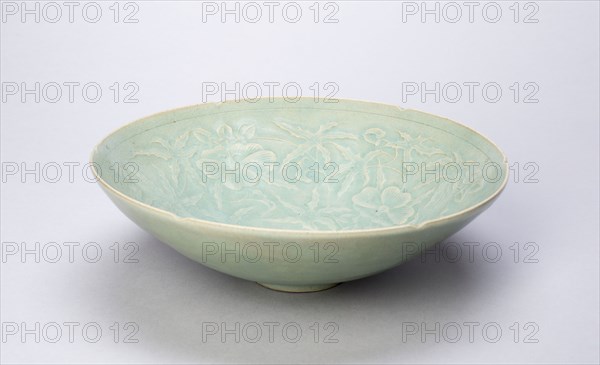 Lobed Bowl with Hibiscus and Floral Medallion, Goryeo dynasty (918–1392), 12th century, Korean, South Korea, Stoneware with underglaze molded design, H. 6.5 cm (2 9/16 in.), diam. 19.8 cm (7 13/16 in.)