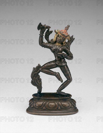 Goddess Vajravarahi Dancing with Chopper (karttrika) and Skullcup (kapala), 15th century, Tibet, Central Tibet, Central Tibet, Bronze with gold paint and pigment, 11.8 × 6.9 × 3.3 cm (4 5/8 × 2 11/16 × 1 5/16 in.)